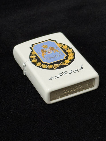 White lighter with Imperial Javidan Guard of Iran emblem, crown, and two guardian lions on black background